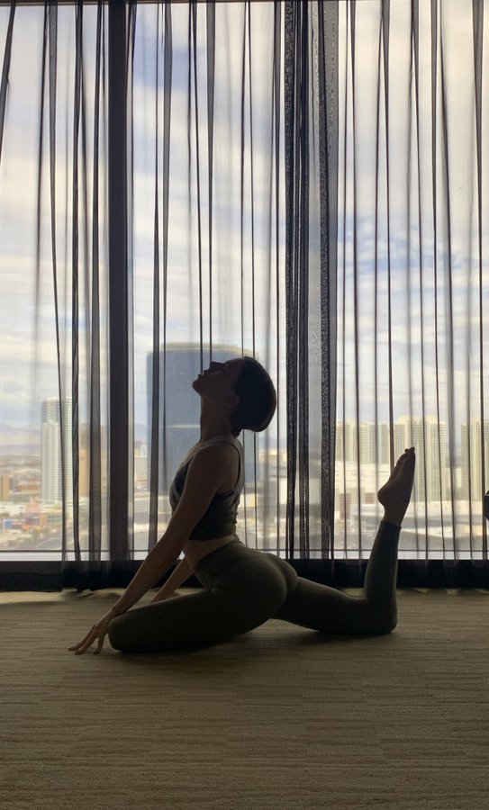 Isabelle Schneider in a yoga pose